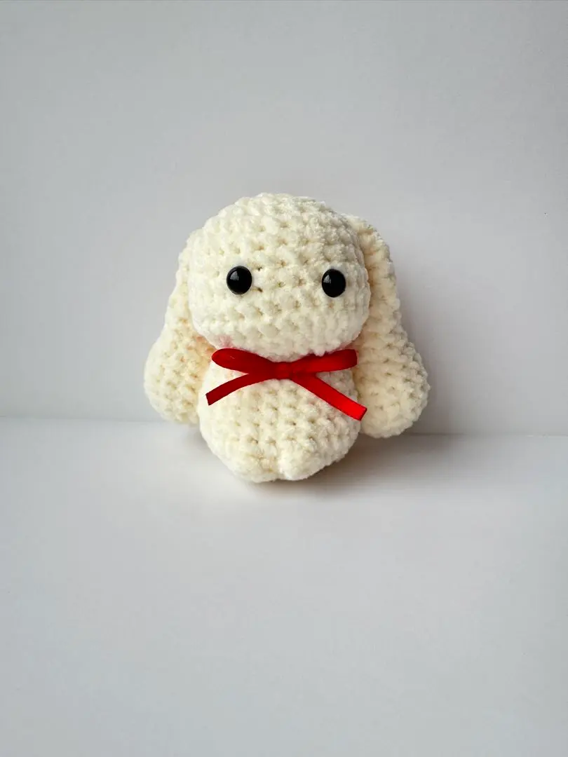 Thumbnail of A red ribboned lop-eared rabbit