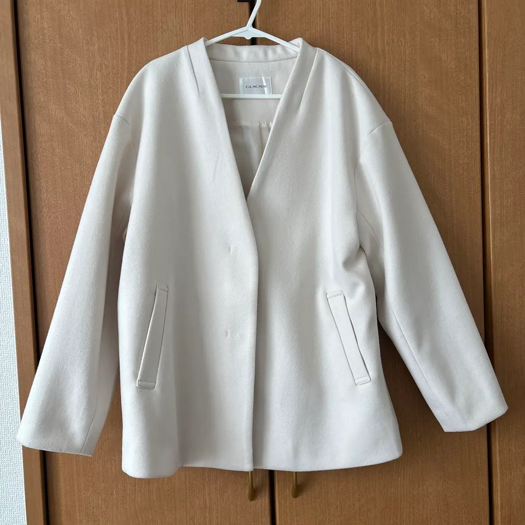 Thumbnail of White coat