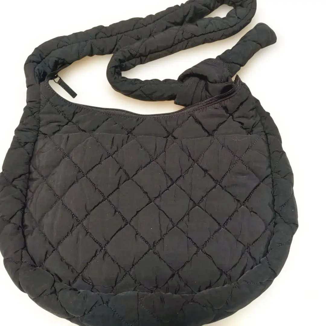 Thumbnail of Black quilted shoulder bag