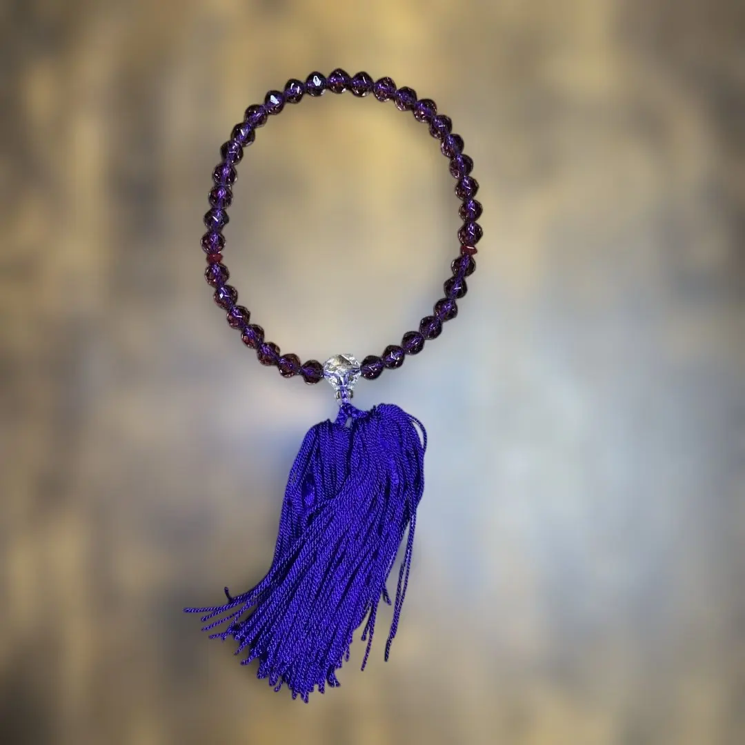 Thumbnail of Purple beaded rosary with tassel