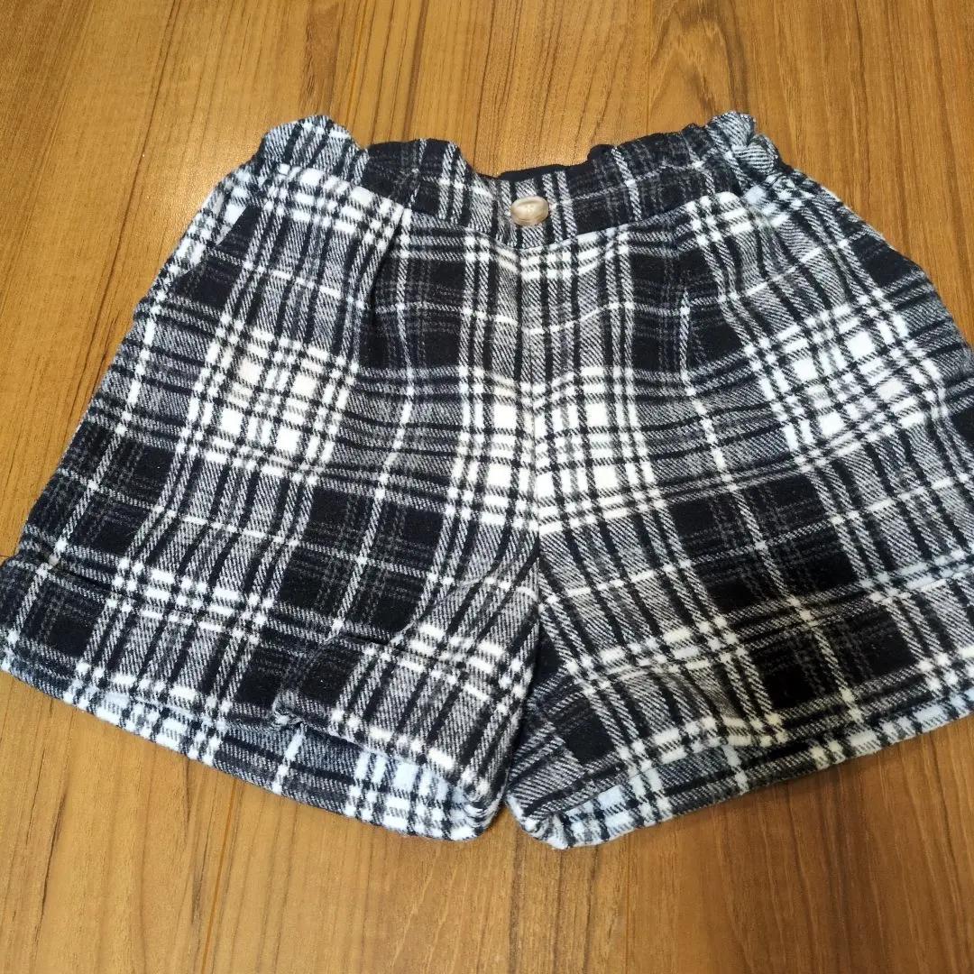Thumbnail of Black and white check shorts, flannel-like
