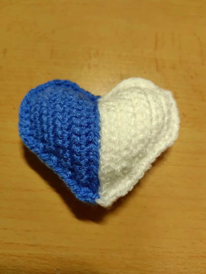 Thumbnail of Blue and white heart-shaped amigurumi