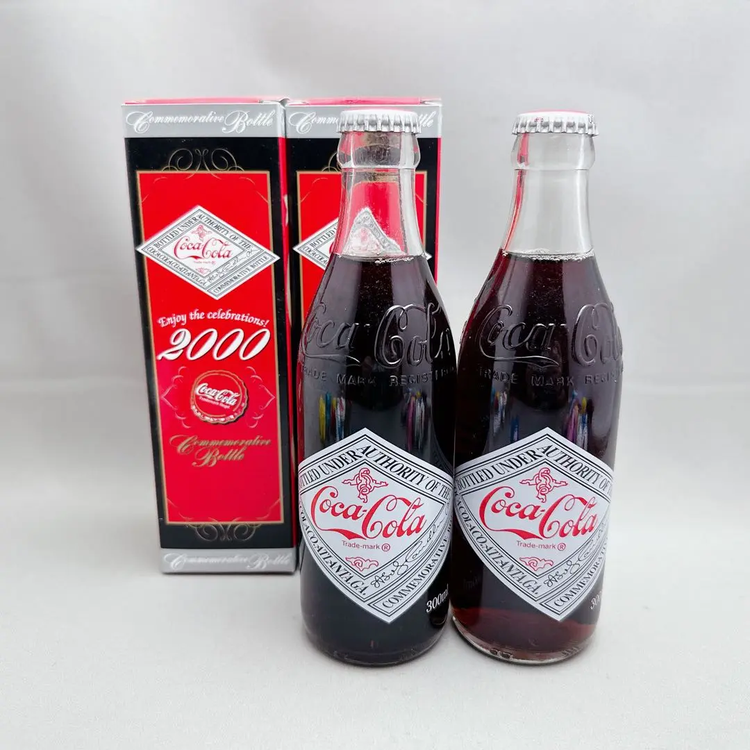 コカコーラ2000ミレニアム記念限定ボトル コカコーラ 2000年記念 ミレニアムボトル（未開封） - メルカリ