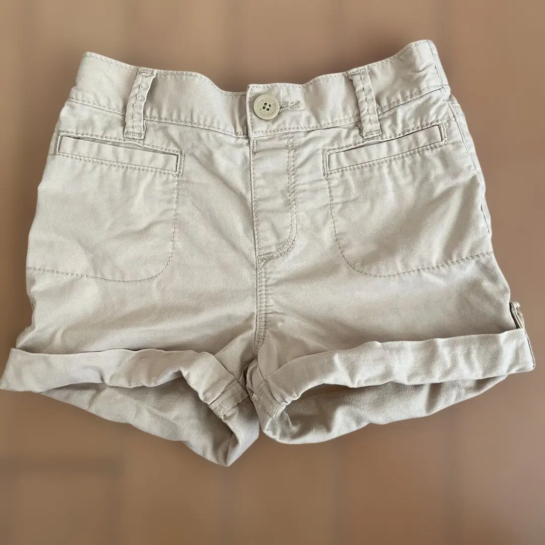 Thumbnail of babyGap Simple Beige Shorts Rolled Up 100