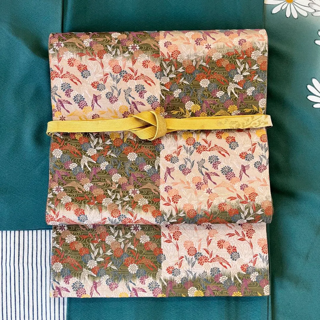 Thumbnail of Fukuro obi (formal obi) in Rikyucha (tea color) and beige with a blurred checkered pattern, featuring flowers and birds. Six-panel design. Silk.