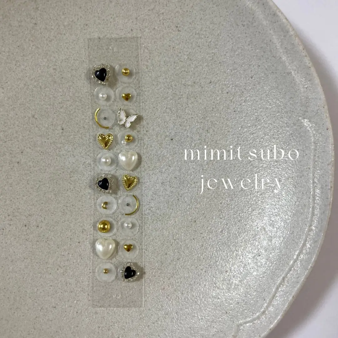 Thumbnail of Ear acupressure jewelry, ear acupressure, black, heart, gold, butterfly, pearl, titanium beads