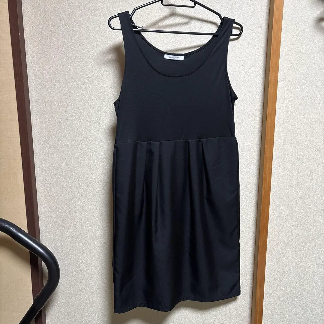 Thumbnail of Beautiful black sleeveless knee-length dress