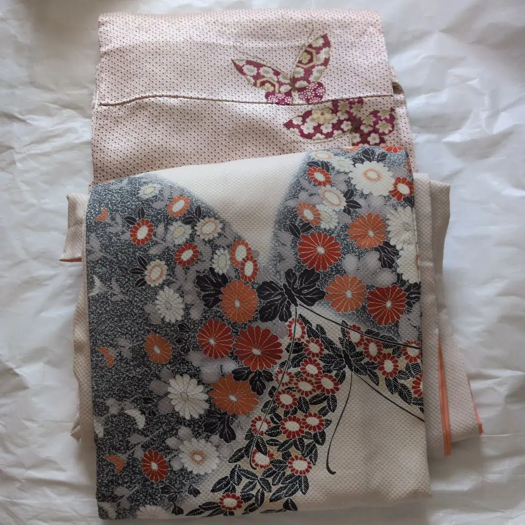 Thumbnail of Kimono with a butterfly and floral pattern; Butterfly Homongi (formal visiting kimono)