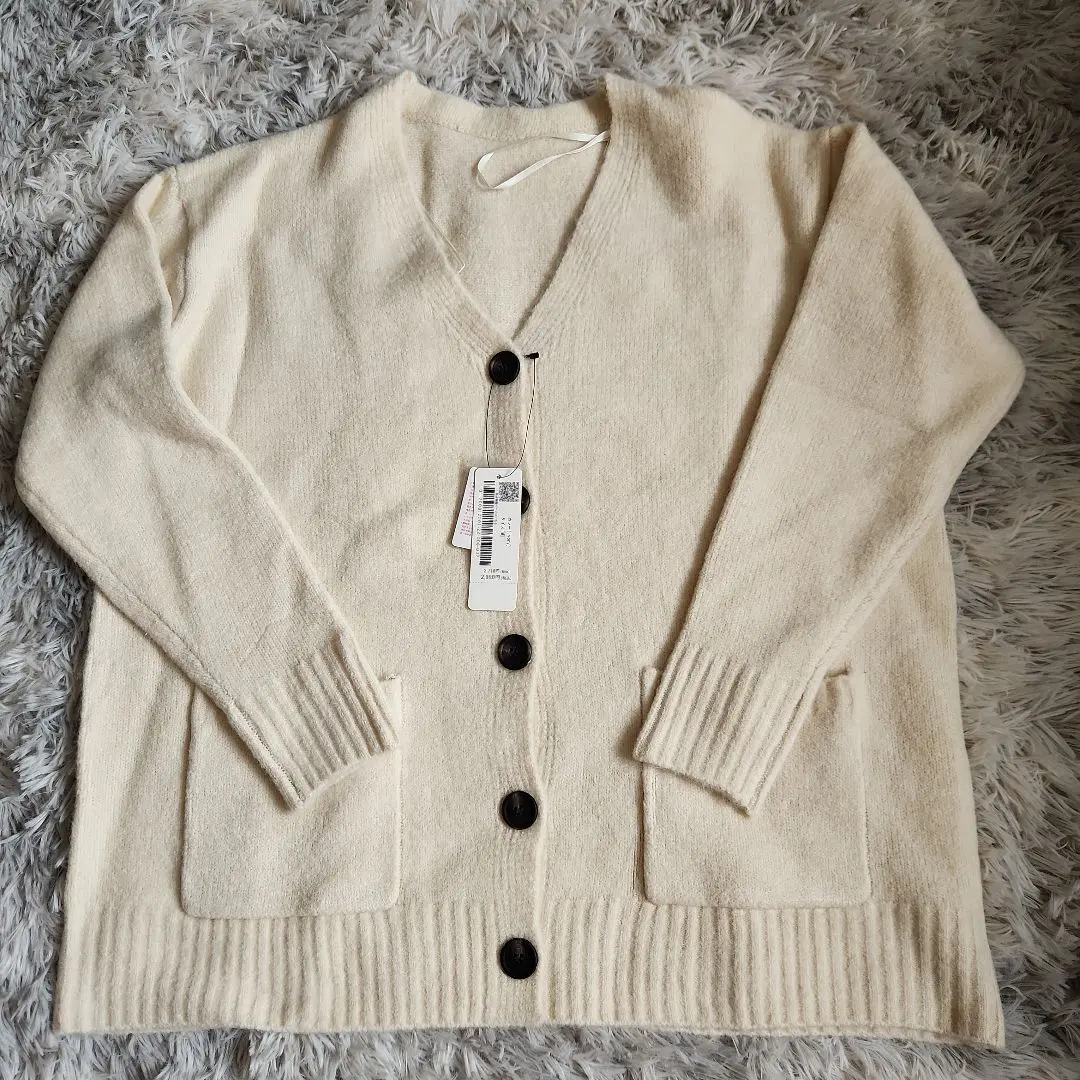 Thumbnail of Ivory cardigan, size M