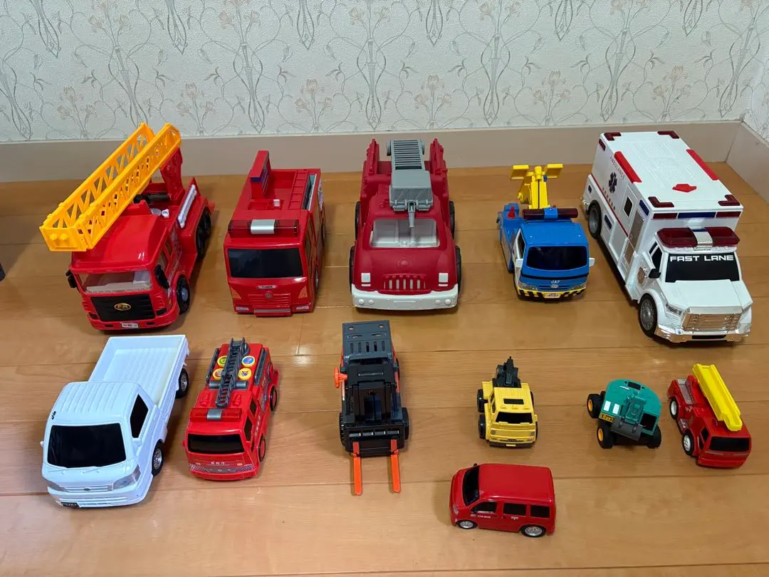 Thumbnail of Miniature car set: ambulance, fire engine, tow truck, etc.