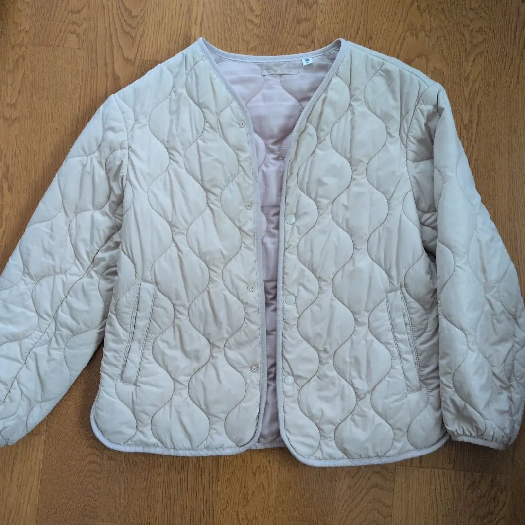 Thumbnail of UNIQLO size 140, beige quilted coat