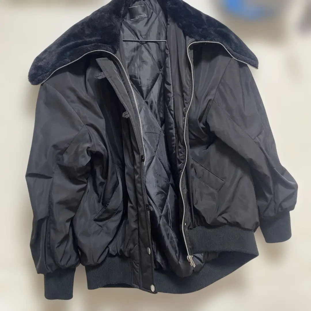 Thumbnail of Black nylon jumper with fur