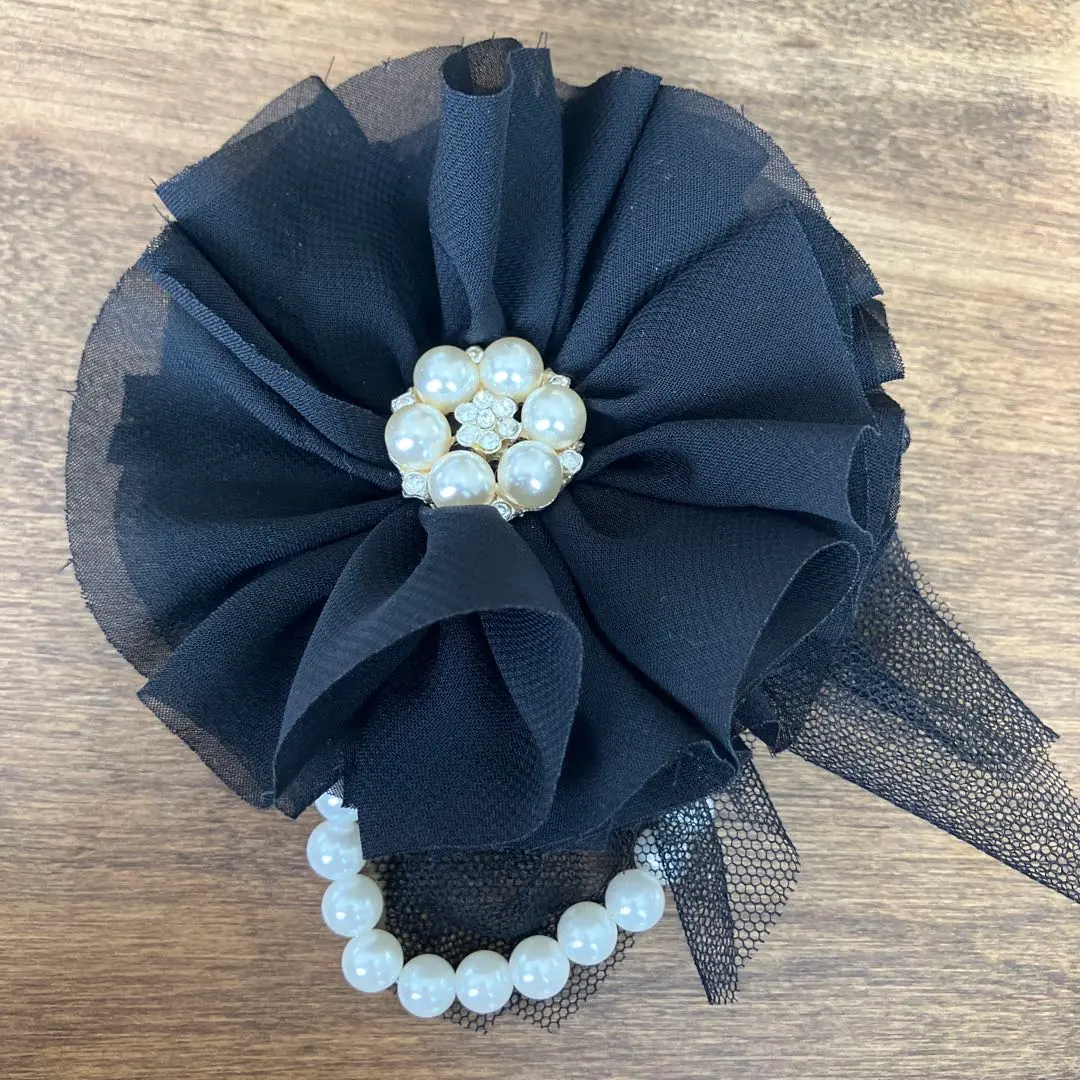 Thumbnail of Black flower brooch/corsage