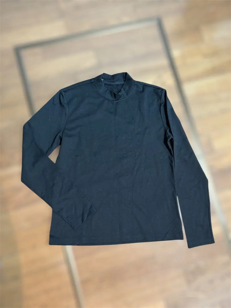 Thumbnail of Black long-sleeved turtleneck top