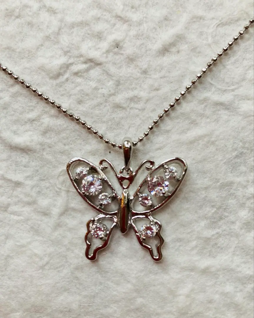 Thumbnail of Butterfly-shaped silver necklace with crystal embellishments