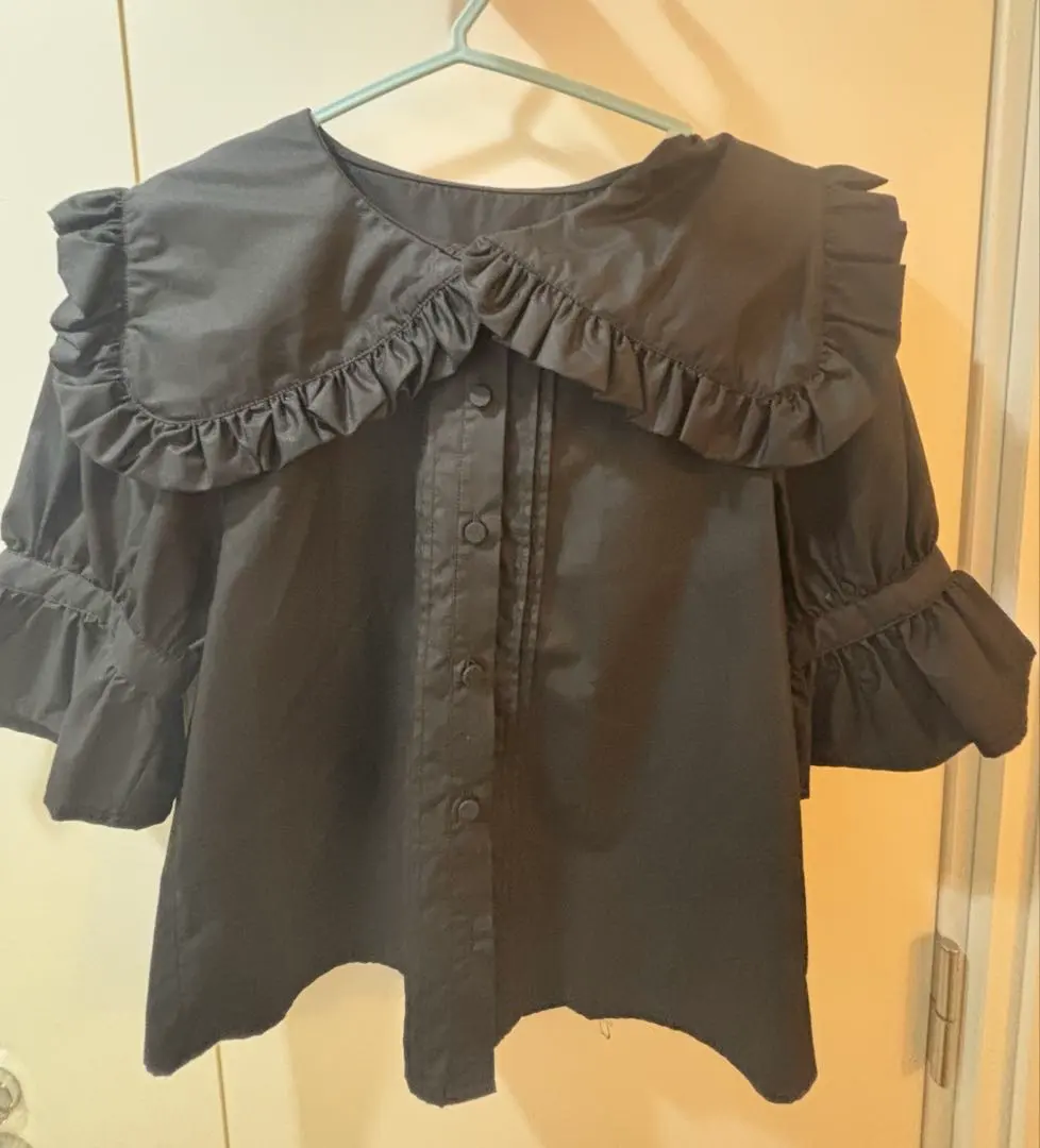 Thumbnail of Black blouse