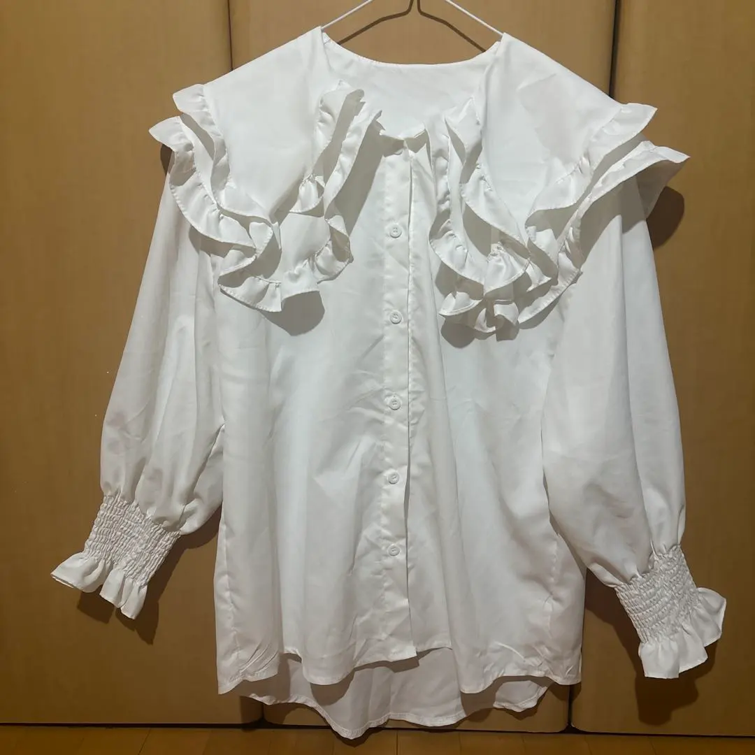 Thumbnail of White blouse with frills