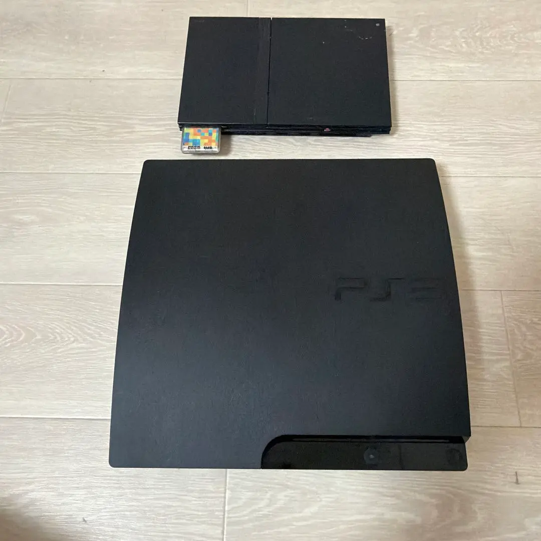 Thumbnail of Sen-sama PlayStation 3 & PlayStation 2 consoles, with games and accessories