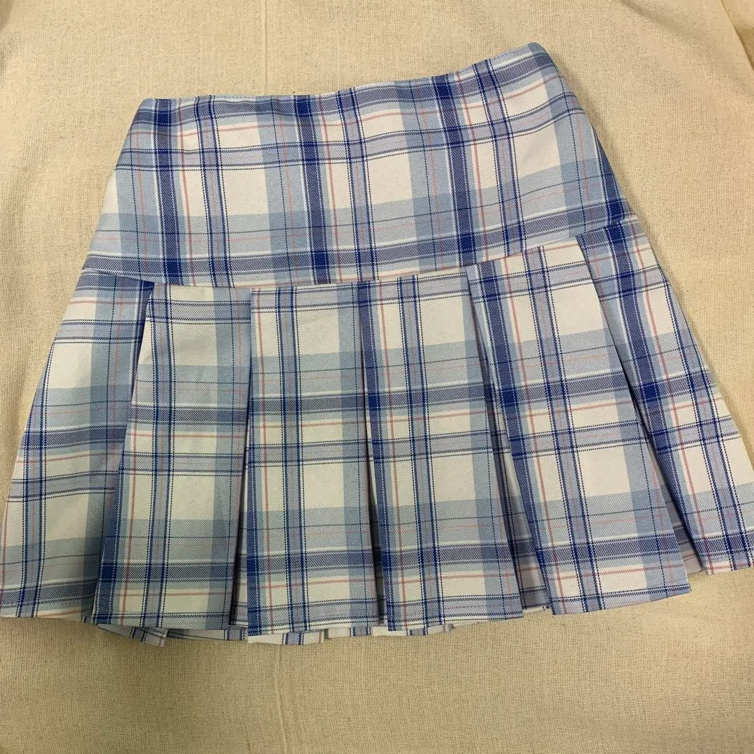 Thumbnail of Blue, light blue, and white plaid pleated skirt, size M