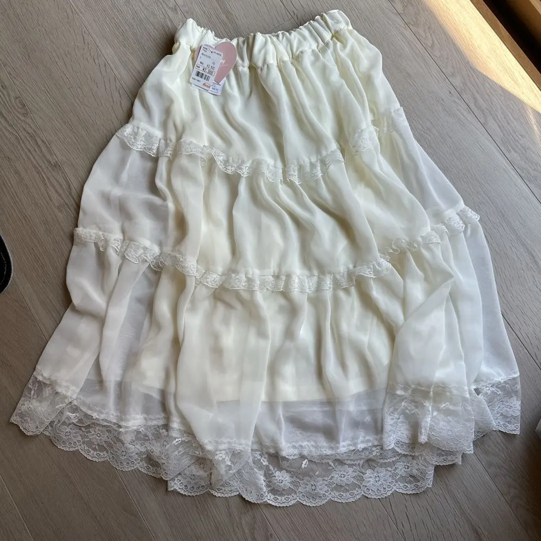 Thumbnail of Brand new, Off-White lace ruffle skirt, size M
