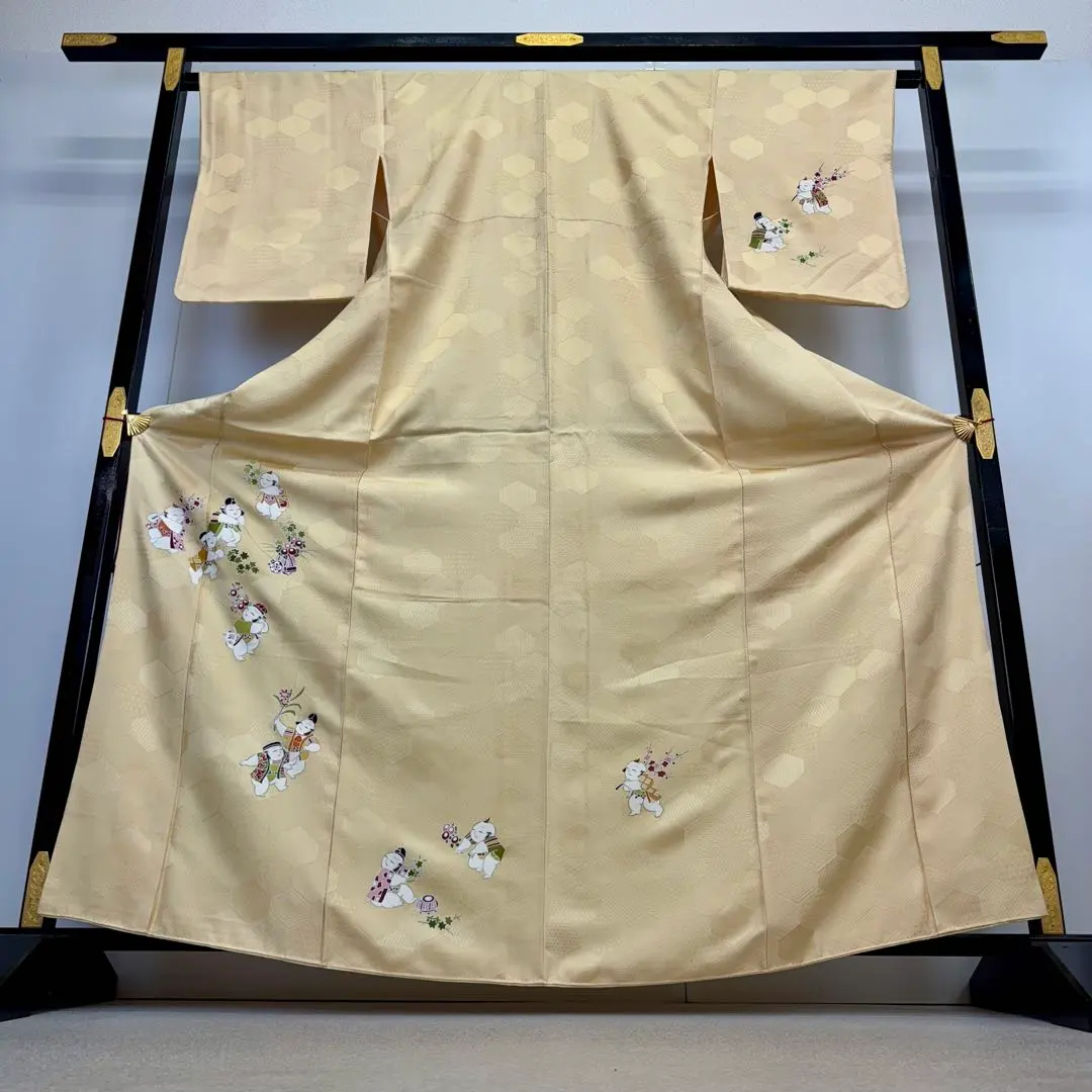 Thumbnail of Tsu-sage (formal kimono) with a child design, geometric pattern, tortoise shell pattern, plum, maple, iris, and eggshell color. NK-1149