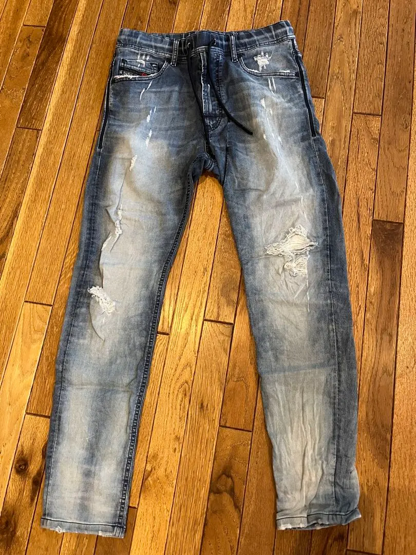 Thumbnail of Diesel distressed blue jeans