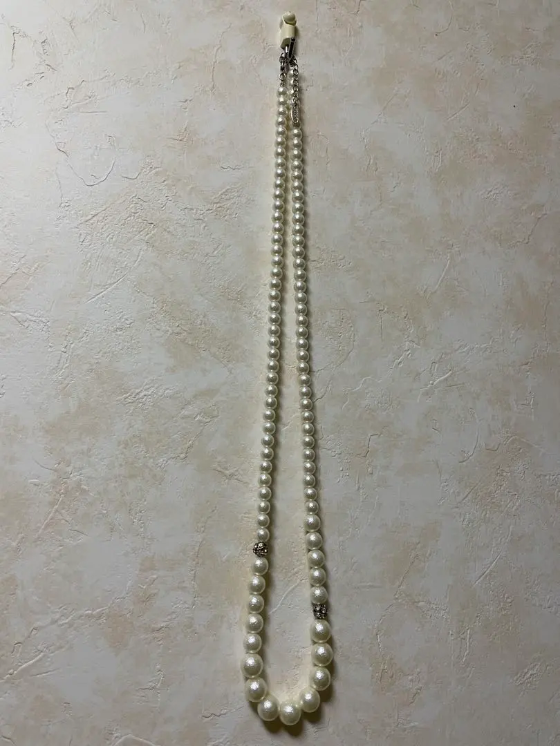 Thumbnail of Faux pearl long necklace