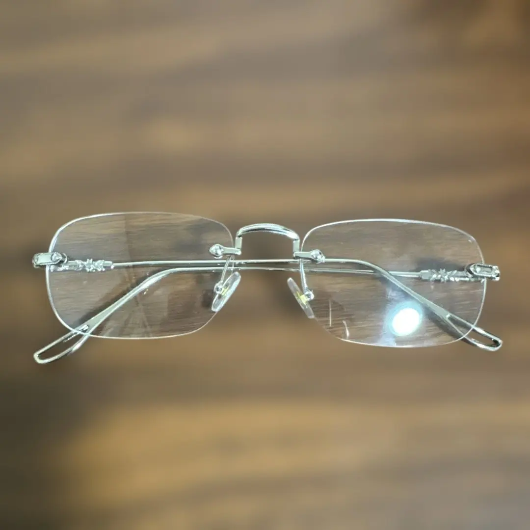Thumbnail of Silver metal frame rimless glasses