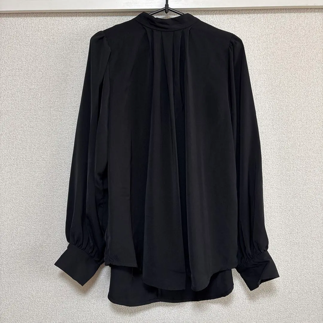 Thumbnail of Black long-sleeved blouse