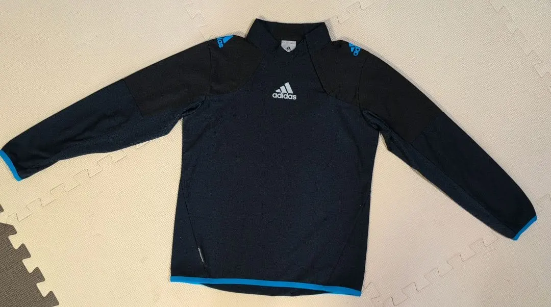 Thumbnail of Adidas navy long-sleeved turtleneck shirt, size 140