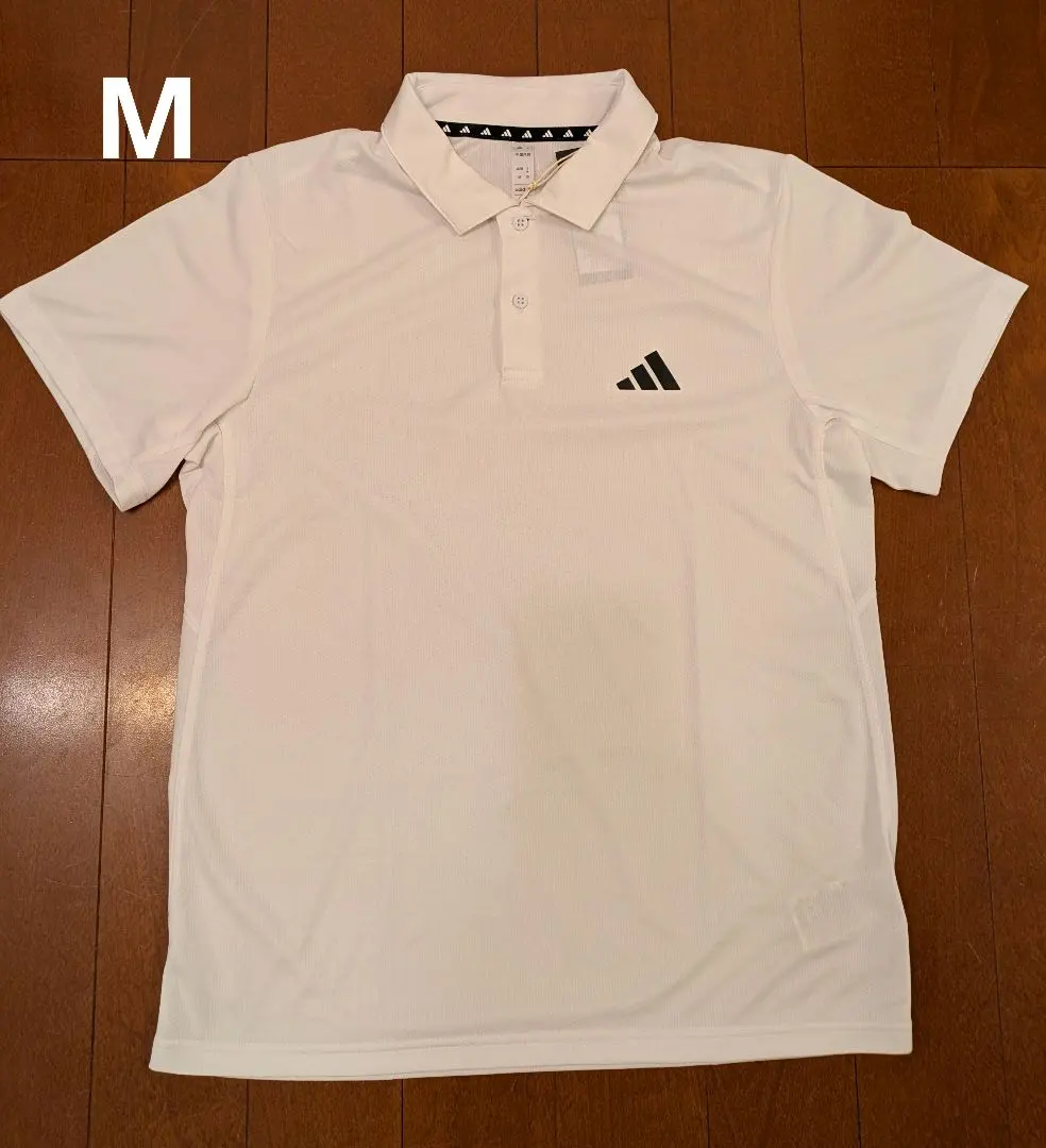 Thumbnail of Adidas polo shirt, size M