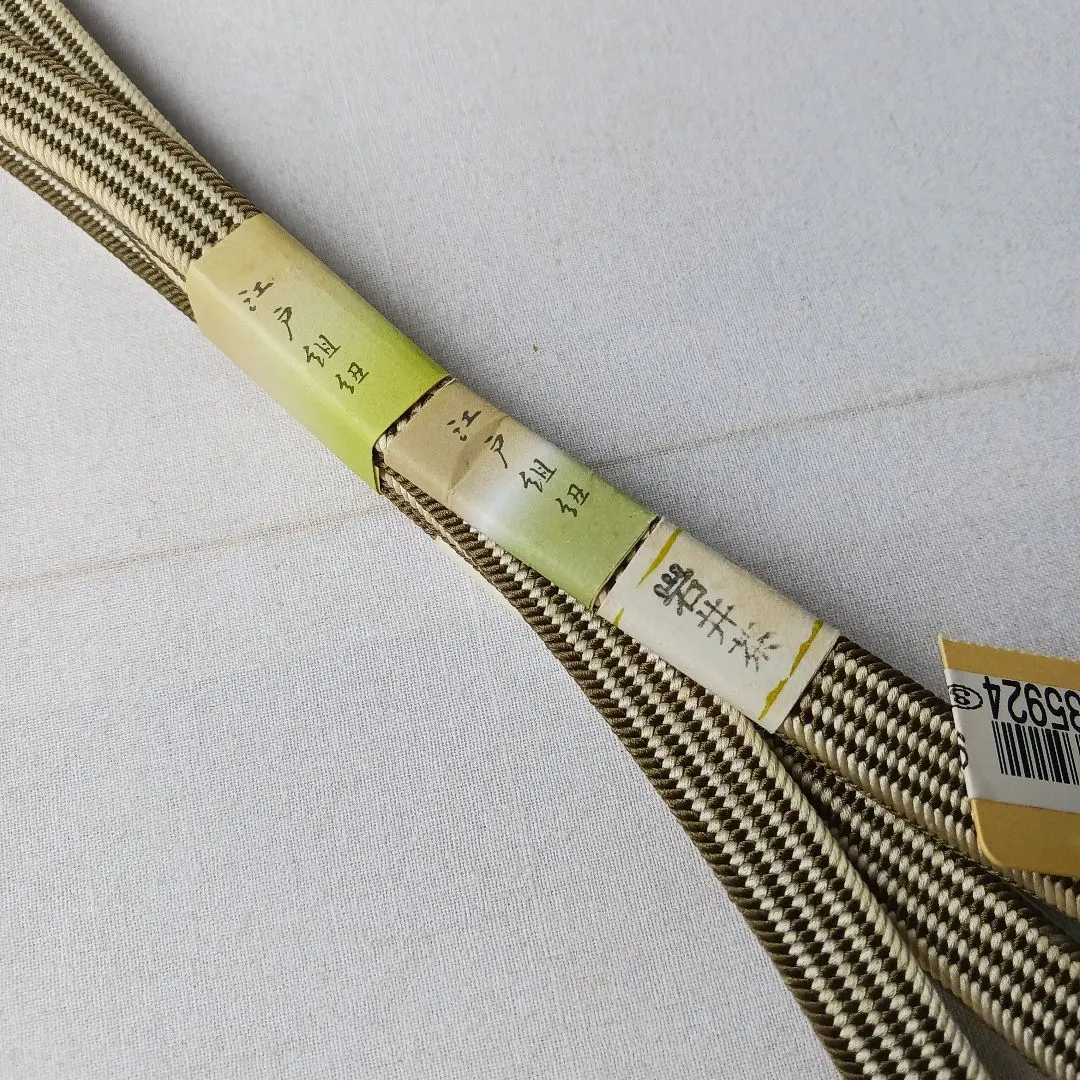 Thumbnail of [Fair] Unused Obijime (decorative belt cord) Hiragumi (flat braid) 13mm Hirata Himo Kakucho-jima (striped pattern) Khaki, slightly flawed