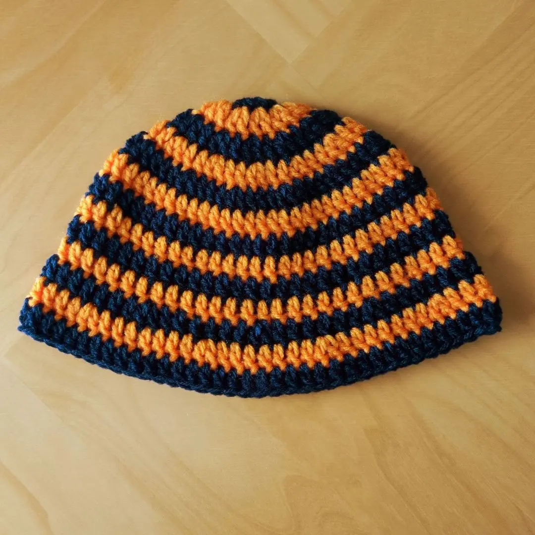 Thumbnail of Cloche hat, bucket hat, beanie, crusher hat, navy blue x orange, border