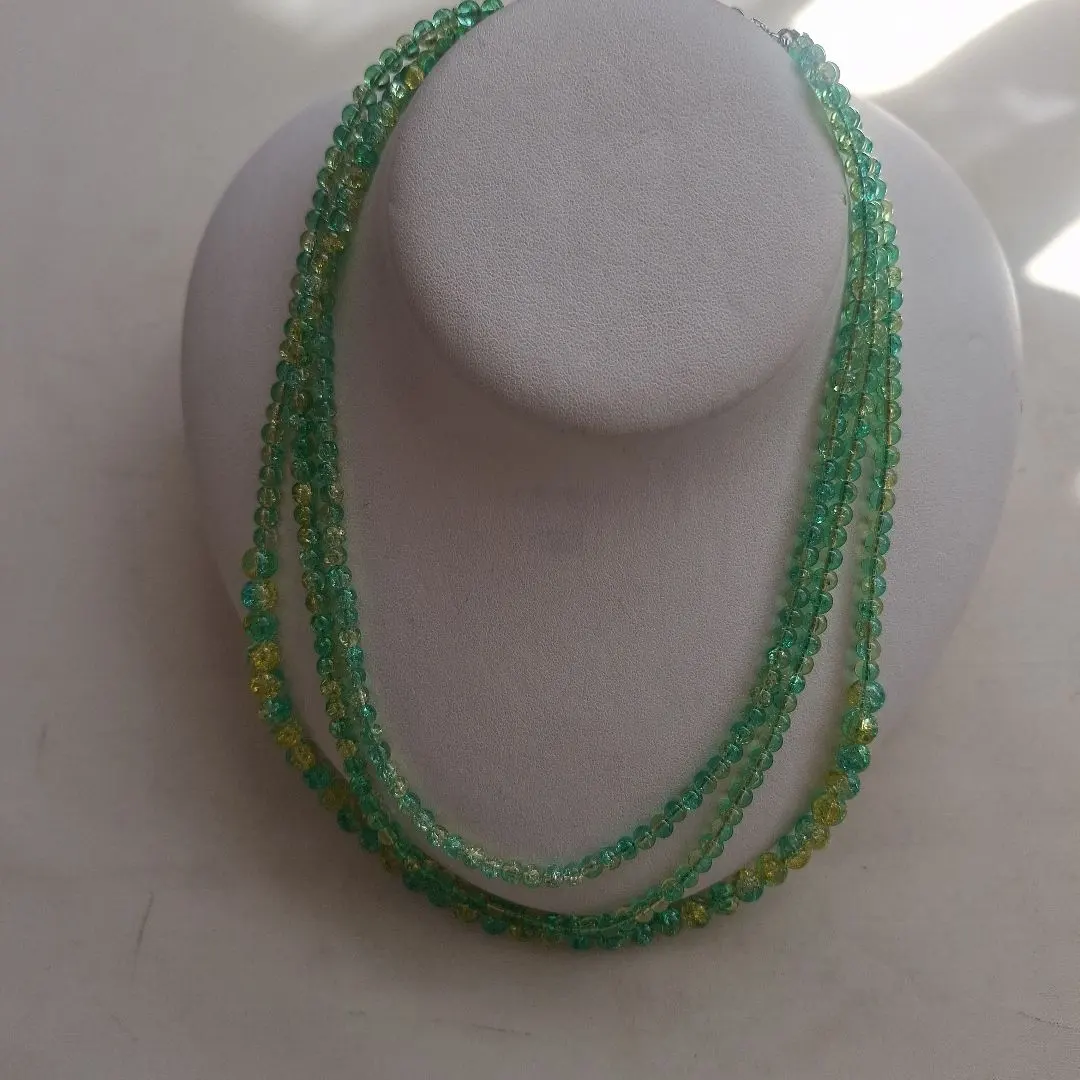 Thumbnail of Three-strand green glass bead necklace
