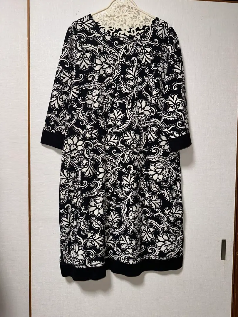 Thumbnail of New, unused, Italian-made, size 46, black and white floral print, stretch fabric, three-quarter sleeve dress