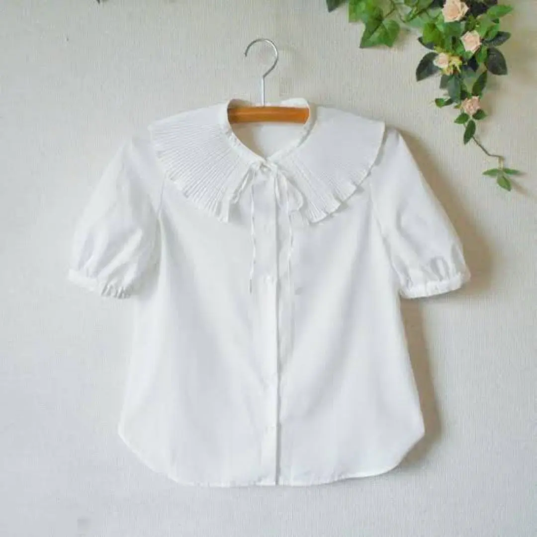 Thumbnail of White shirt with frills, size M