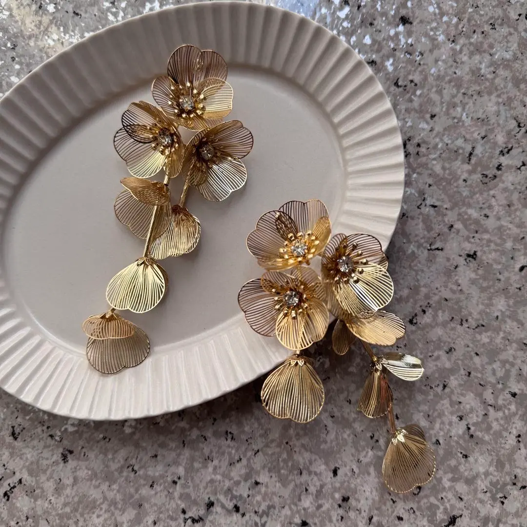 Thumbnail of Gold flower motif earrings, wedding earrings, occasion, party, glamorous