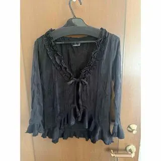 Thumbnail of Black long-sleeved top with frills