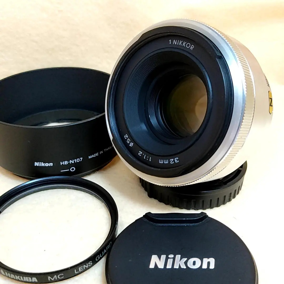 ★美品★単焦点レンズ Nikon 1 NIKKOR 32mm F1.2 ブラック Yahoo!オークション -「nikon 1 nikkor 32mm f1.2」(家電、AV