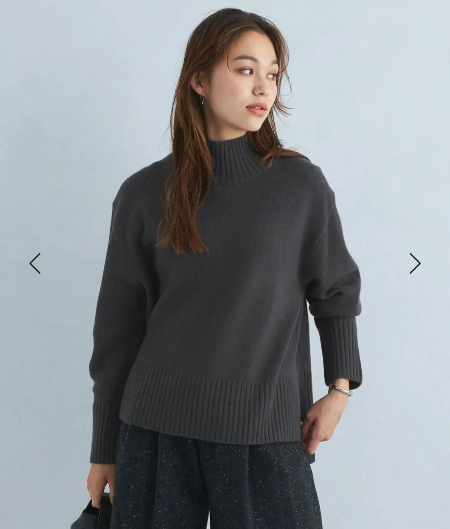 Thumbnail of green label relaxing 100% wool back slit sweater