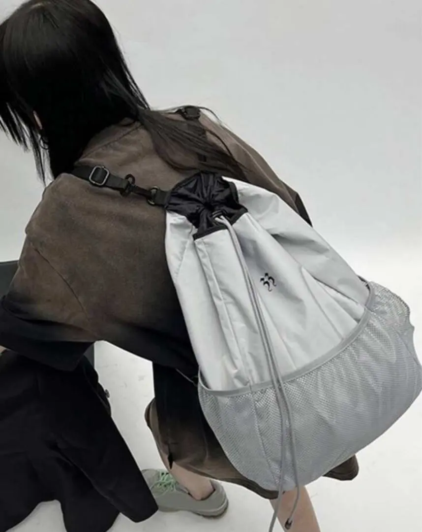 Thumbnail of Gray backpack with mesh pocket