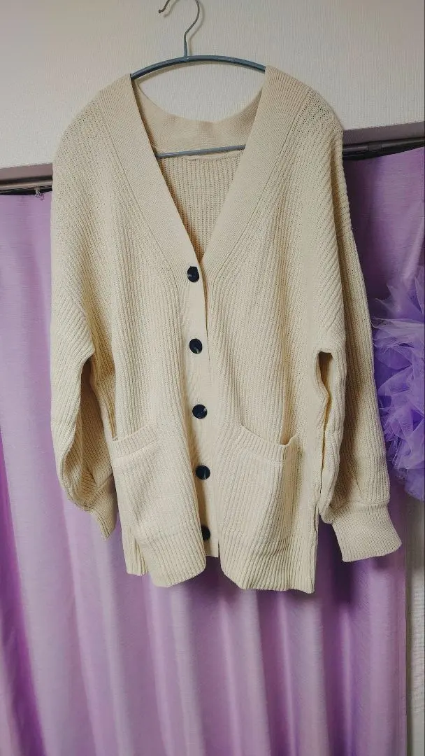 Thumbnail of Rib-knit cream-colored cardigan