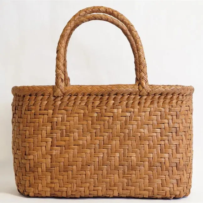 Thumbnail of Woven mountain grape vine basket bag, beautiful condition. A tasteful, exquisite piece.