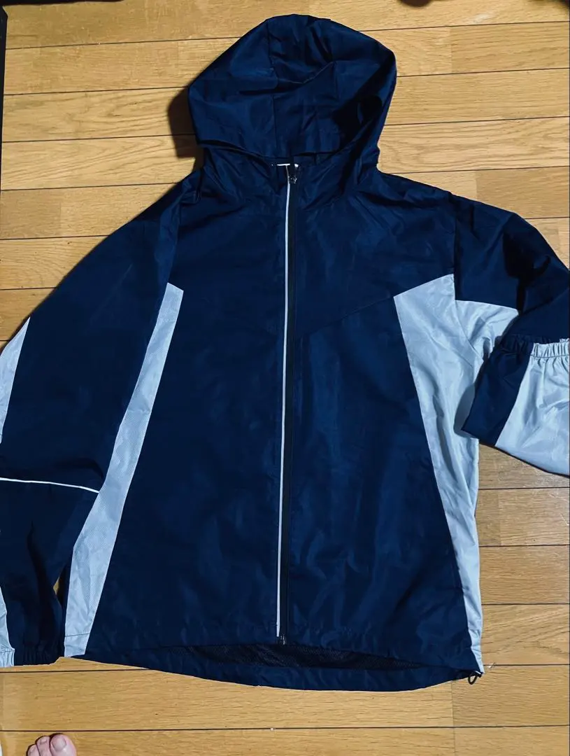 Thumbnail of Navy and gray windbreaker