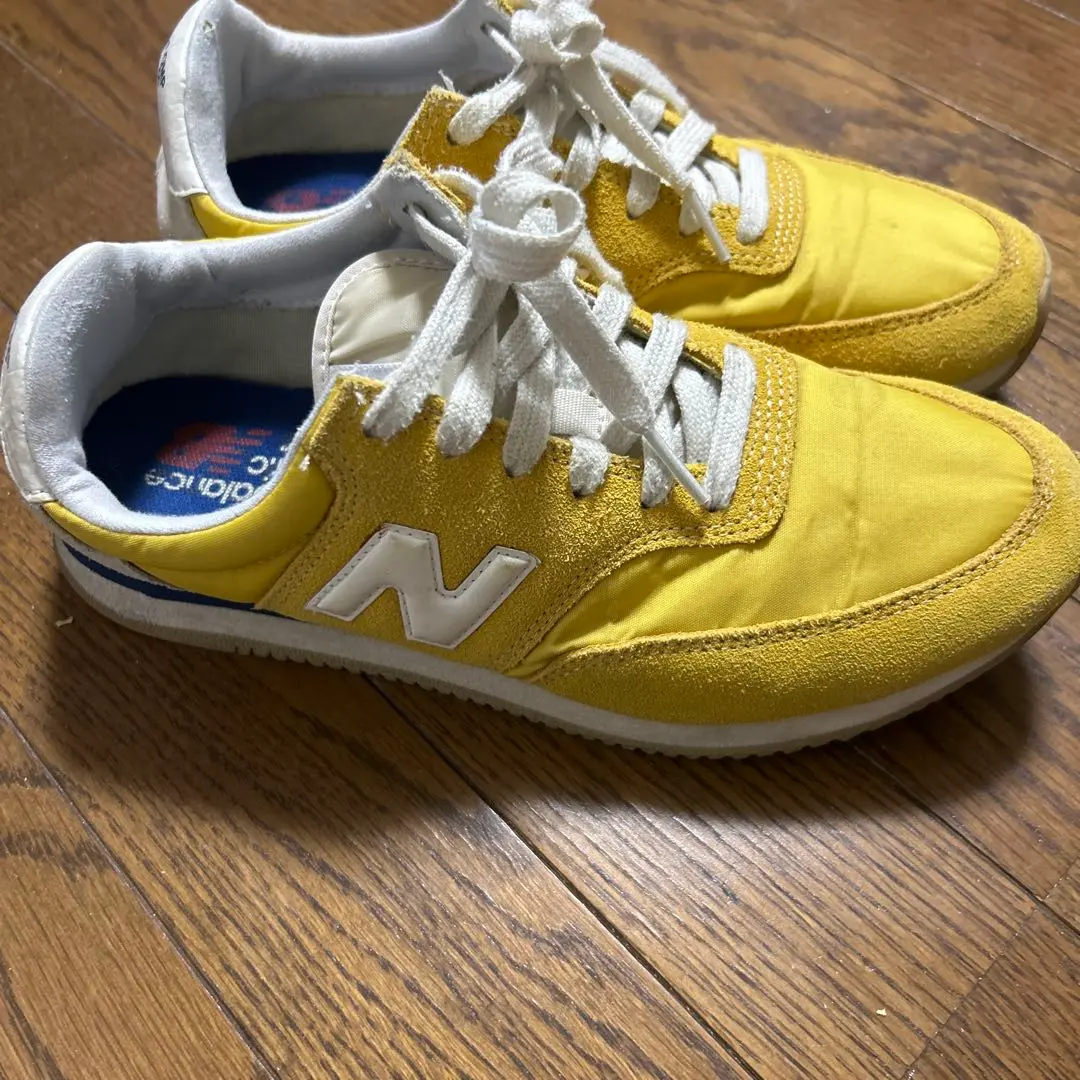 Thumbnail of New Balance yellow sneakers