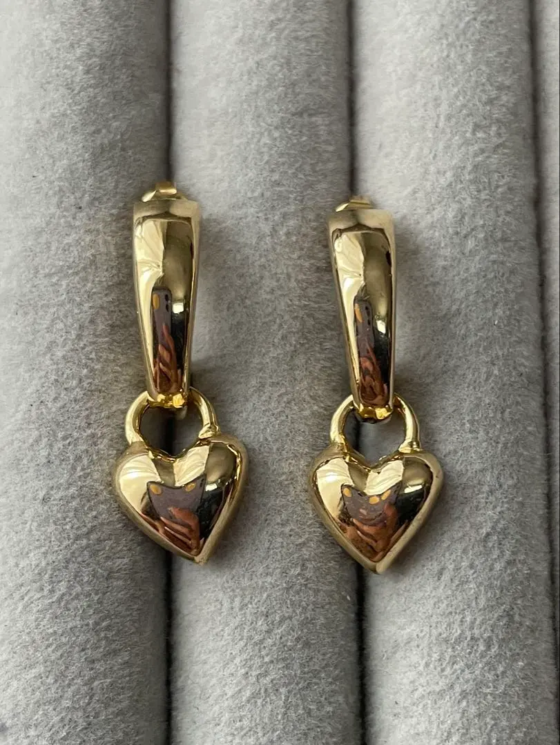 Thumbnail of Gold color heart earrings