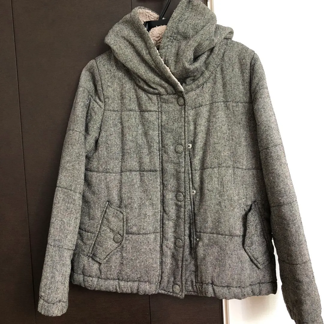 Thumbnail of Gray quilted jacket with hood