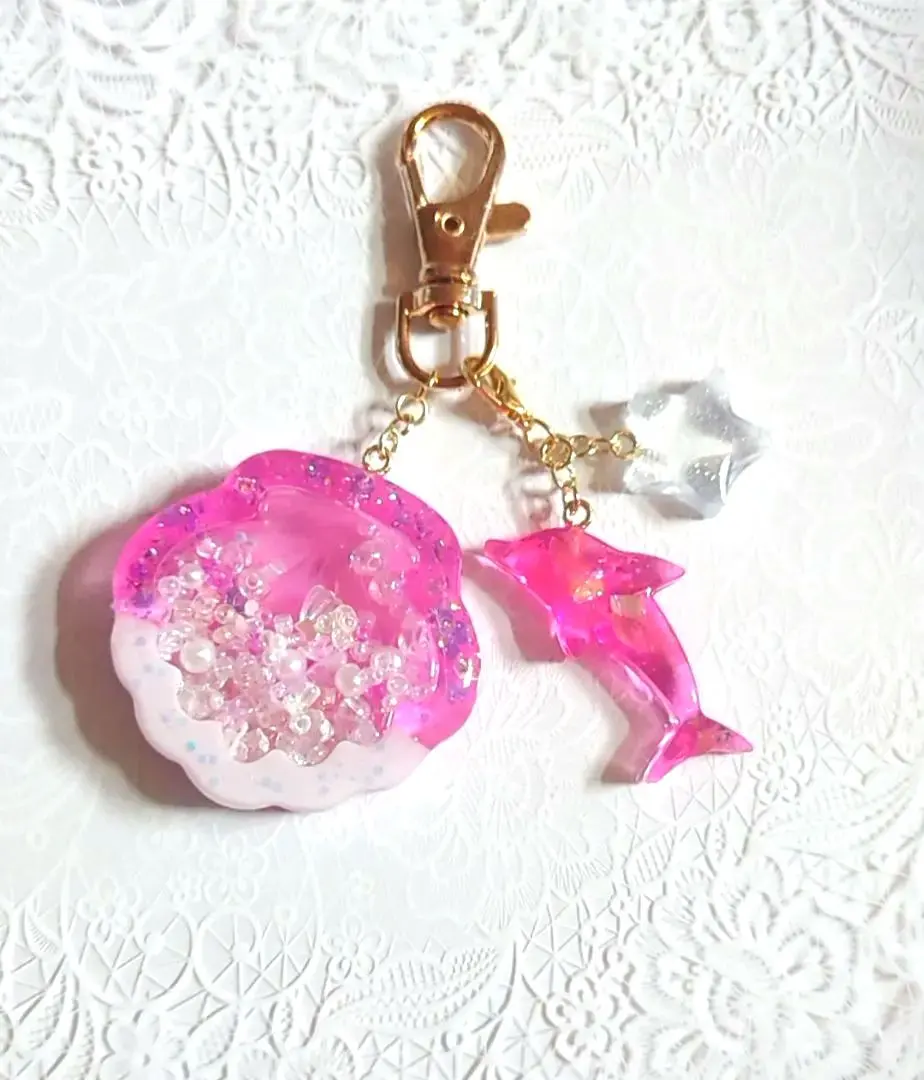 Thumbnail of Shell & Dolphin Charm✩.*˚ Sparkling Pink