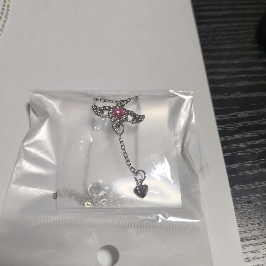 Thumbnail of Heart-shaped charm necklace