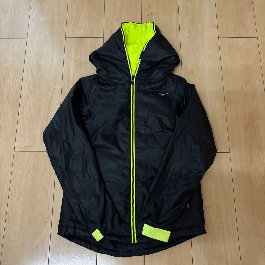 Thumbnail of Black hooded jacket with neon yellow accents